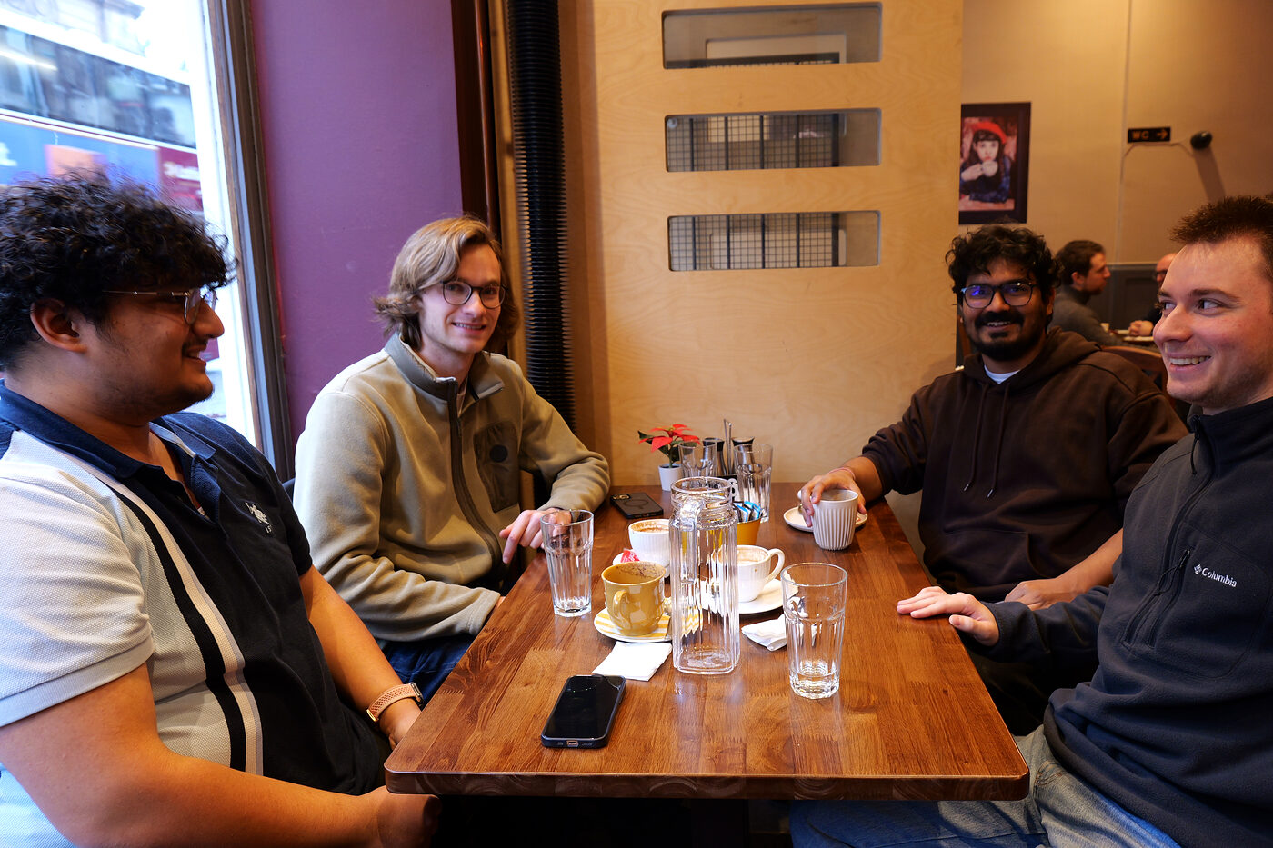 Coffees, four round the corner table